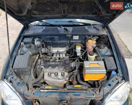 Дэу Ланос 2004 в Борисполе на Automoto.ua Зеленый Дэу Ланос, объемом двигателя 1.5 л и пробегом 376 тыс. км за 2250 $, фото 11 на Automoto.ua
