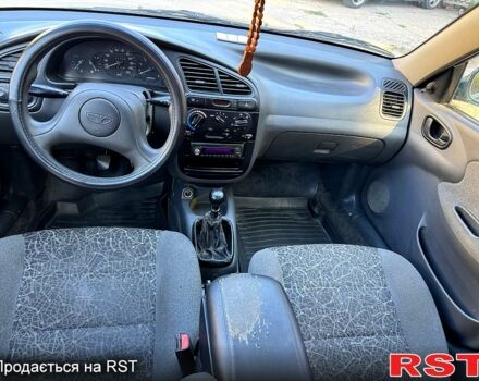 Зеленый Дэу Ланос, объемом двигателя 1.5 л и пробегом 200 тыс. км за 1450 $, фото 6 на Automoto.ua