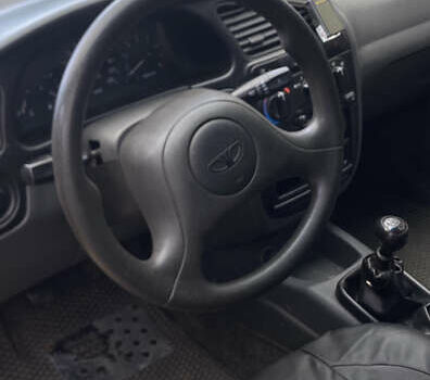 Зеленый Дэу Ланос, объемом двигателя 1.5 л и пробегом 180 тыс. км за 2500 $, фото 6 на Automoto.ua