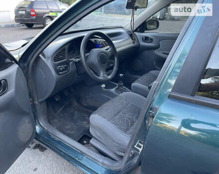 Зеленый Дэу Ланос, объемом двигателя 1.5 л и пробегом 325 тыс. км за 1800 $, фото 7 на Automoto.ua