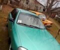Зеленый Дэу Ланос, объемом двигателя 15 л и пробегом 298 тыс. км за 1000 $, фото 2 на Automoto.ua