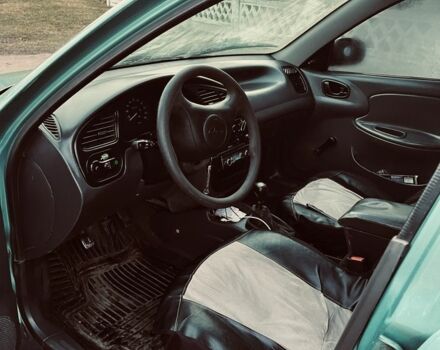 Зеленый Дэу Ланос, объемом двигателя 1.5 л и пробегом 300 тыс. км за 1100 $, фото 3 на Automoto.ua