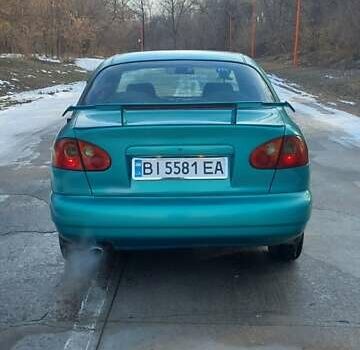 Зелений Деу Ланос, об'ємом двигуна 1.5 л та пробігом 209 тис. км за 2000 $, фото 3 на Automoto.ua