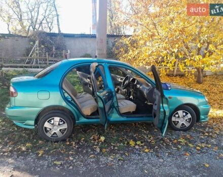 Зелений Деу Ланос, об'ємом двигуна 1.5 л та пробігом 240 тис. км за 3200 $, фото 8 на Automoto.ua