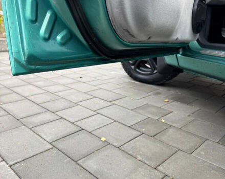 Зеленый Дэу Ланос, объемом двигателя 2 л и пробегом 220 тыс. км за 2900 $, фото 6 на Automoto.ua