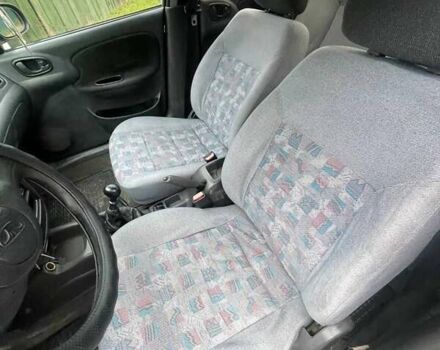 Зеленый Дэу Ланос, объемом двигателя 1.5 л и пробегом 474 тыс. км за 1250 $, фото 5 на Automoto.ua