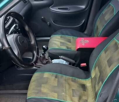 Деу Ланос 1998 у Ужгороді на Automoto.ua Зелений Деу Ланос, об'ємом двигуна 1.5 л та пробігом 350 тис. км за 1200 $, фото 6 на Automoto.ua