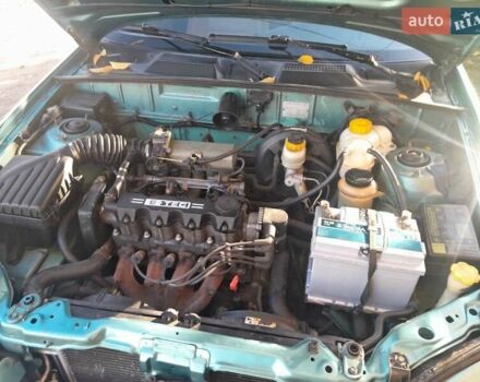 Зелений Деу Ланос, об'ємом двигуна 1.5 л та пробігом 240 тис. км за 3200 $, фото 9 на Automoto.ua