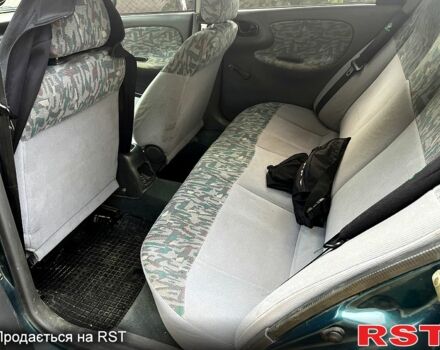 Зеленый Дэу Ланос, объемом двигателя 1.5 л и пробегом 0 тыс. км за 1350 $, фото 3 на Automoto.ua