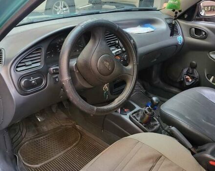 Зеленый Дэу Ланос, объемом двигателя 1.5 л и пробегом 268 тыс. км за 1200 $, фото 8 на Automoto.ua