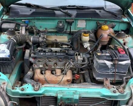 Деу Ланос 1998 у Ужгороді на Automoto.ua Зелений Деу Ланос, об'ємом двигуна 1.5 л та пробігом 350 тис. км за 1200 $, фото 4 на Automoto.ua