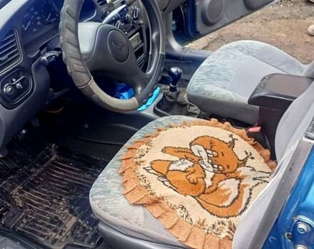 Зеленый Дэу Ланос, объемом двигателя 1.5 л и пробегом 300 тыс. км за 1600 $, фото 5 на Automoto.ua