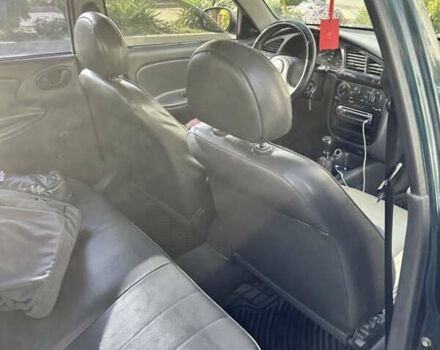 Зеленый Дэу Ланос, объемом двигателя 1.5 л и пробегом 215 тыс. км за 1900 $, фото 4 на Automoto.ua