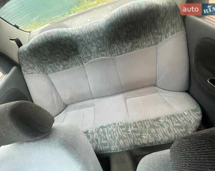 Зеленый Дэу Ланос, объемом двигателя 1.5 л и пробегом 474 тыс. км за 1250 $, фото 1 на Automoto.ua