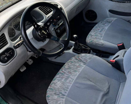 Зеленый Дэу Ланос, объемом двигателя 2 л и пробегом 220 тыс. км за 2900 $, фото 5 на Automoto.ua