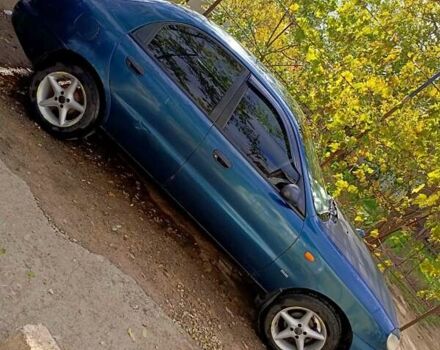 Зеленый Дэу Ланос, объемом двигателя 1.5 л и пробегом 120 тыс. км за 1550 $, фото 3 на Automoto.ua