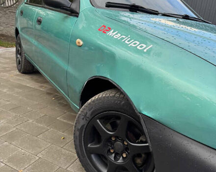 Зеленый Дэу Ланос, объемом двигателя 2 л и пробегом 220 тыс. км за 2900 $, фото 1 на Automoto.ua