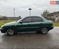 Зеленый Дэу Ланос, объемом двигателя 1.5 л и пробегом 300 тыс. км за 2000 $, фото 1 на Automoto.ua