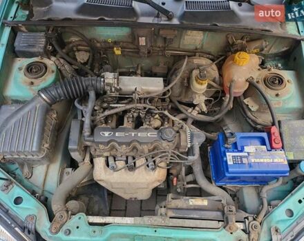 Зеленый Дэу Ланос, объемом двигателя 1.5 л и пробегом 268 тыс. км за 1200 $, фото 6 на Automoto.ua