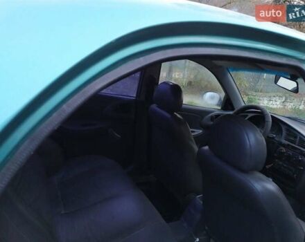 Зеленый Дэу Ланос, объемом двигателя 1.5 л и пробегом 245 тыс. км за 1100 $, фото 3 на Automoto.ua