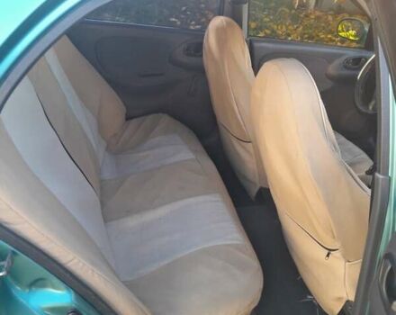 Зелений Деу Ланос, об'ємом двигуна 1.5 л та пробігом 240 тис. км за 3200 $, фото 3 на Automoto.ua