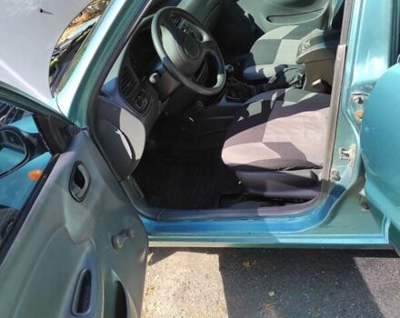 Дэу Ланос 1998 в Черкассах на Automoto.ua Зеленый Дэу Ланос, объемом двигателя 1.5 л и пробегом 548 тыс. км за 1200 $, фото 4 на Automoto.ua