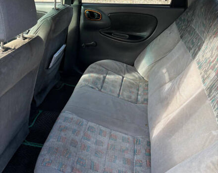 Зелений Деу Ланос, об'ємом двигуна 1.5 л та пробігом 300 тис. км за 1699 $, фото 8 на Automoto.ua