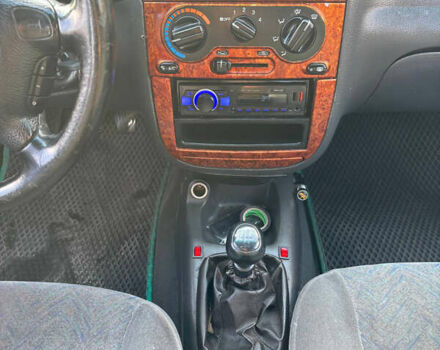 Зелений Деу Ланос, об'ємом двигуна 1.5 л та пробігом 300 тис. км за 1699 $, фото 7 на Automoto.ua