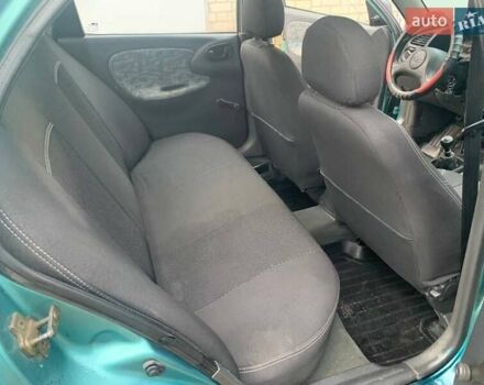 Зелений Деу Ланос, об'ємом двигуна 1.5 л та пробігом 178 тис. км за 1320 $, фото 17 на Automoto.ua
