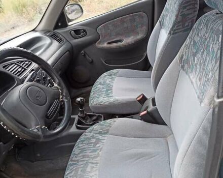 Зеленый Дэу Ланос, объемом двигателя 1.5 л и пробегом 280 тыс. км за 1400 $, фото 6 на Automoto.ua