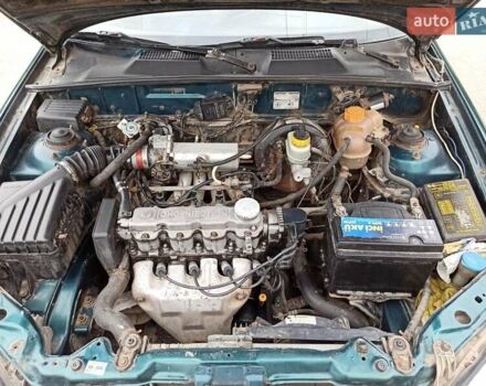 Зеленый Дэу Ланос, объемом двигателя 1.5 л и пробегом 280 тыс. км за 1400 $, фото 5 на Automoto.ua