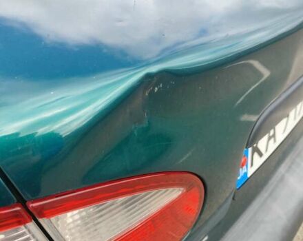 Зеленый Дэу Ланос, объемом двигателя 1.5 л и пробегом 225 тыс. км за 1900 $, фото 6 на Automoto.ua