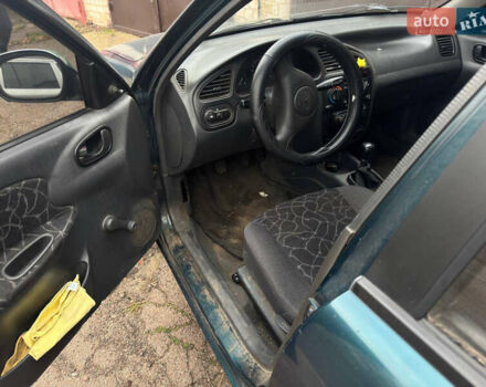 Зеленый Дэу Ланос, объемом двигателя 1.5 л и пробегом 230 тыс. км за 1250 $, фото 2 на Automoto.ua