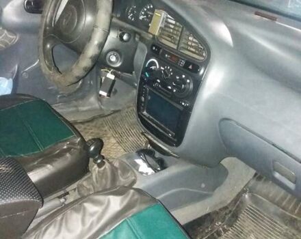 Зеленый Дэу Ланос, объемом двигателя 1.3 л и пробегом 320 тыс. км за 1250 $, фото 1 на Automoto.ua