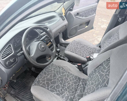 Зеленый Дэу Ланос, объемом двигателя 1.5 л и пробегом 100 тыс. км за 1500 $, фото 5 на Automoto.ua