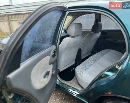 Зелений Деу Ланос, об'ємом двигуна 1.5 л та пробігом 200 тис. км за 1500 $, фото 10 на Automoto.ua