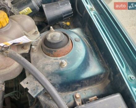 Зеленый Дэу Ланос, объемом двигателя 1.5 л и пробегом 225 тыс. км за 1900 $, фото 24 на Automoto.ua