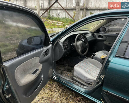 Зеленый Дэу Ланос, объемом двигателя 1.5 л и пробегом 200 тыс. км за 1400 $, фото 26 на Automoto.ua