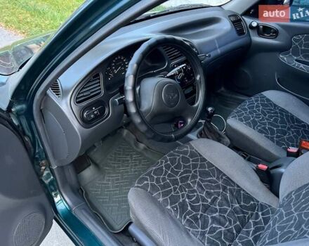 Зеленый Дэу Ланос, объемом двигателя 1.5 л и пробегом 267 тыс. км за 2750 $, фото 2 на Automoto.ua