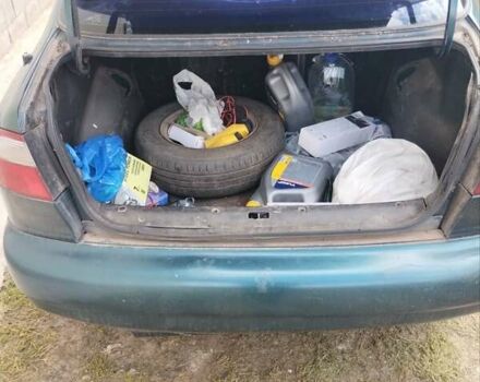 Зеленый Дэу Ланос, объемом двигателя 1.5 л и пробегом 303 тыс. км за 1000 $, фото 6 на Automoto.ua