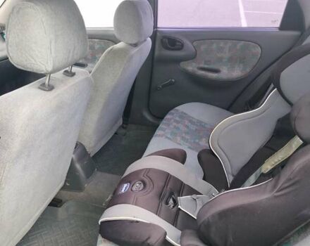 Зеленый Дэу Ланос, объемом двигателя 1.5 л и пробегом 225 тыс. км за 1900 $, фото 18 на Automoto.ua