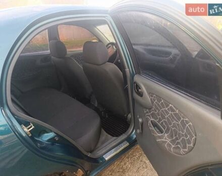 Зелений Деу Ланос, об'ємом двигуна 1.6 л та пробігом 290 тис. км за 1450 $, фото 9 на Automoto.ua