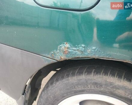 Зеленый Дэу Ланос, объемом двигателя 1.5 л и пробегом 225 тыс. км за 1900 $, фото 8 на Automoto.ua