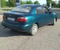 Деу Ланос 2002 у Петропавловке на Automoto.ua Зелений Деу Ланос, об'ємом двигуна 1.5 л та пробігом 300 тис. км за 1600 $, фото 2 на Automoto.ua