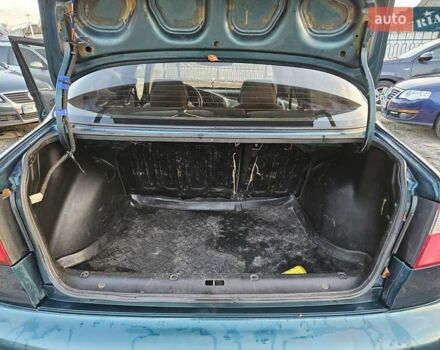 Зеленый Дэу Ланос, объемом двигателя 1.5 л и пробегом 296 тыс. км за 3000 $, фото 12 на Automoto.ua