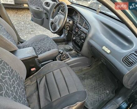 Зеленый Дэу Ланос, объемом двигателя 1.5 л и пробегом 296 тыс. км за 3000 $, фото 4 на Automoto.ua