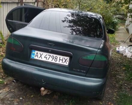 Деу Ланос 2003 у Люботине на Automoto.ua Зелений Деу Ланос, об'ємом двигуна 1.5 л та пробігом 200 тис. км за 2000 $, фото 1 на Automoto.ua