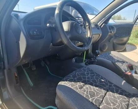 Дэу Ланос 2003 в Коростышеве на Automoto.ua Зеленый Дэу Ланос, объемом двигателя 1.5 л и пробегом 241 тыс. км за 2500 $, фото 10 на Automoto.ua