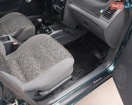 Зелений Деу Ланос, об'ємом двигуна 1.5 л та пробігом 178 тис. км за 3100 $, фото 30 на Automoto.ua