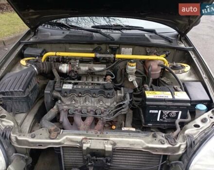 Зеленый Дэу Ланос, объемом двигателя 1.5 л и пробегом 313 тыс. км за 1750 $, фото 6 на Automoto.ua